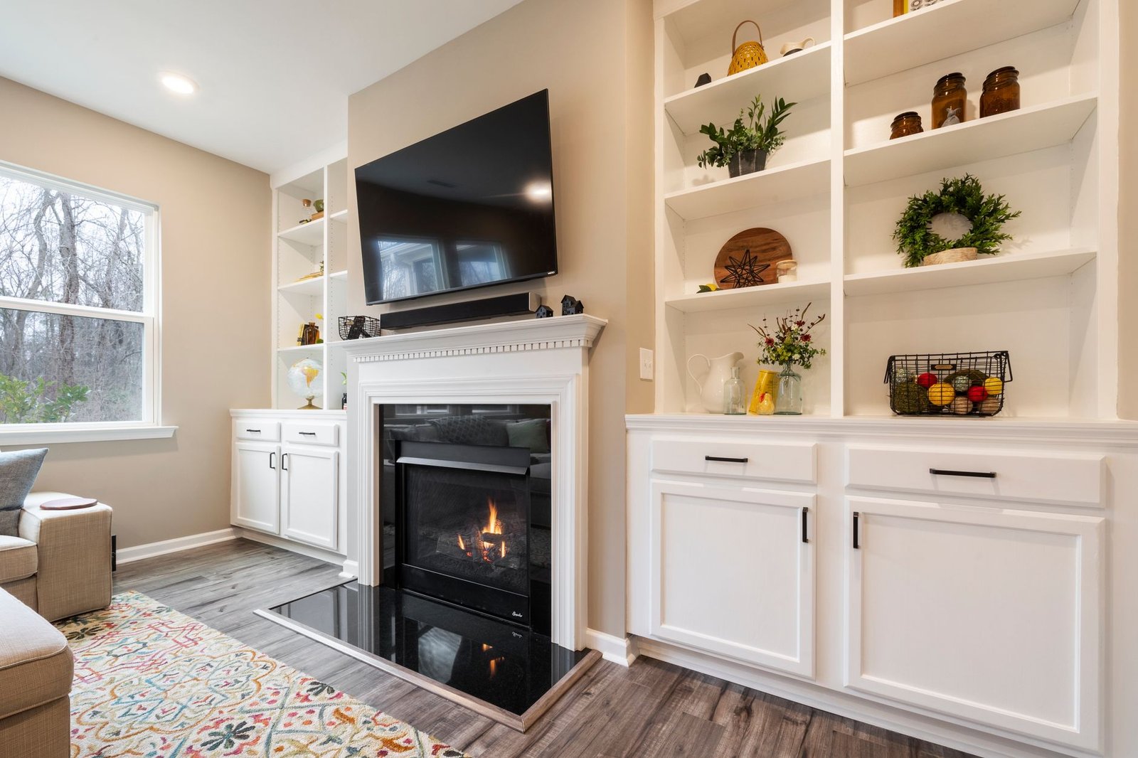 tv and fireplace in room