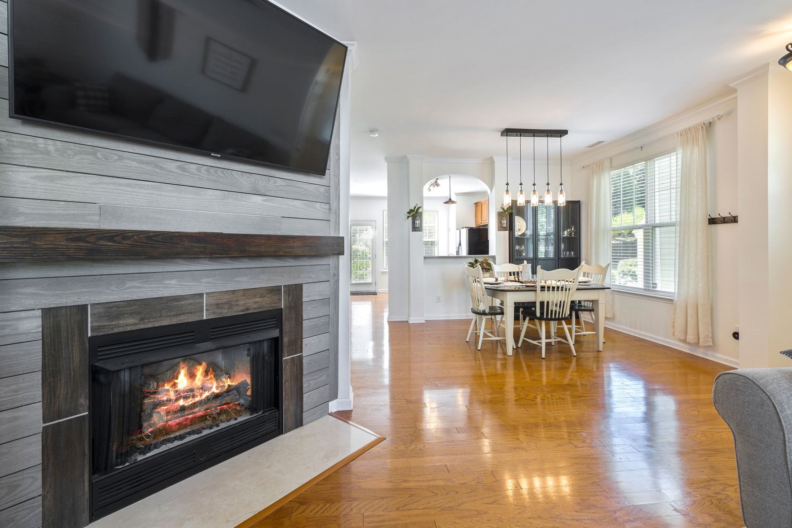 a contemporary dining area near a fireplace